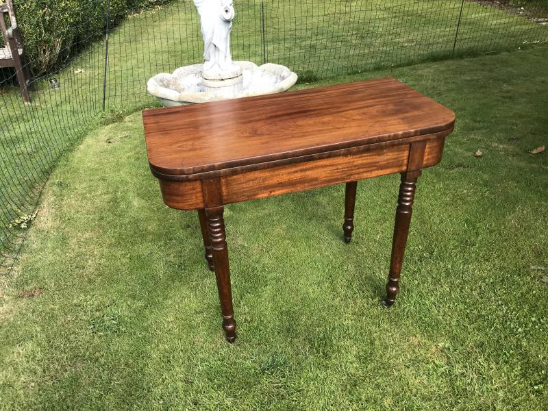 Georgian Mahogany revolving fold out card table circa 1820.