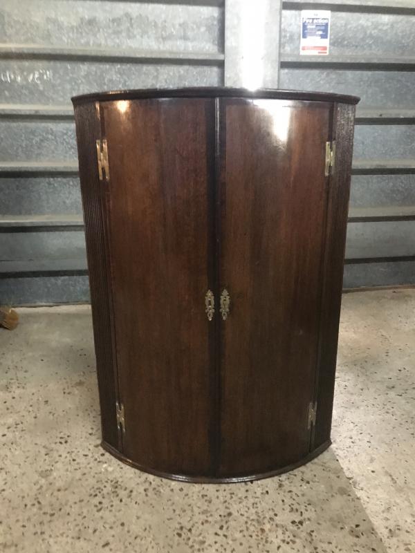 Beautiful Georgian rounded corner cupboard with key .