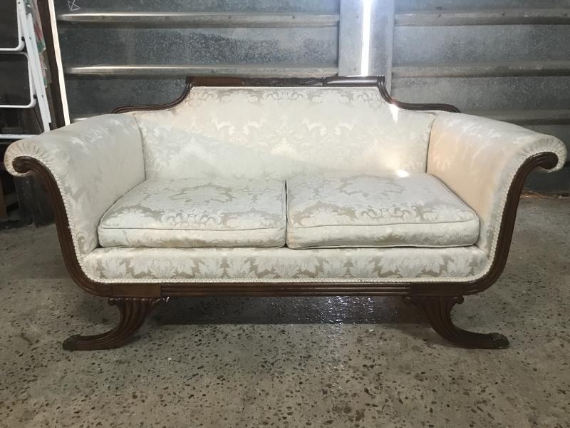 Beautiful Regency style sofa with scroll arms