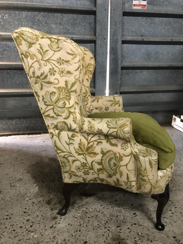 French Queen Anne style wing back chair with embroidered upholstery.
