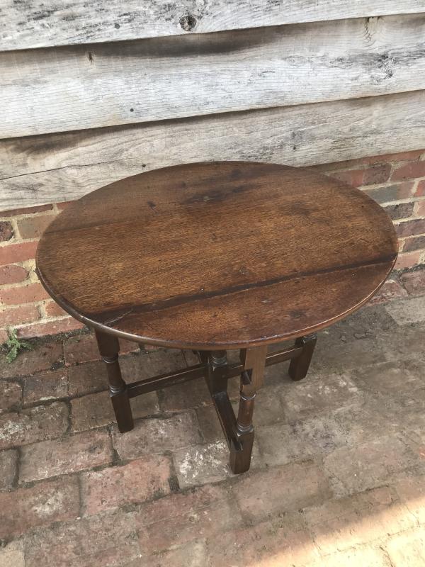 19th century oak  fold up / gate leg table .