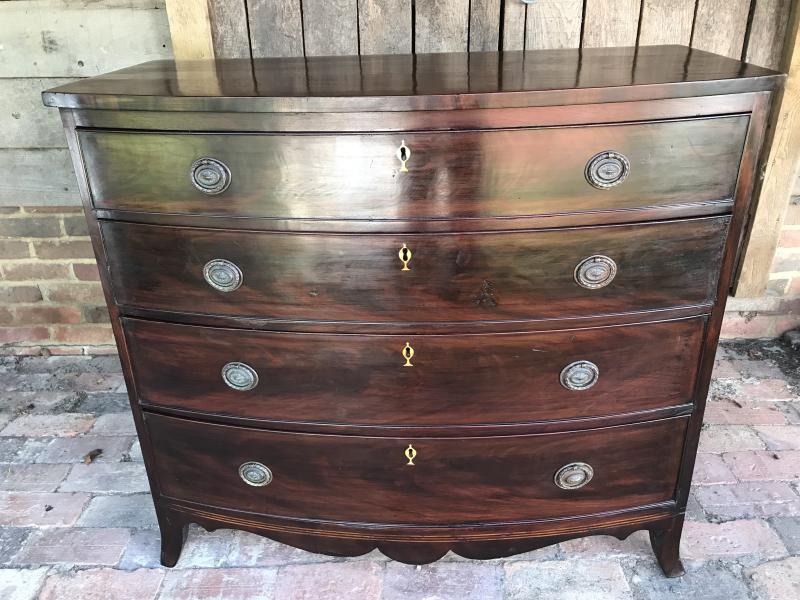 Regency Mahogany 4 drawer bow front chest .
